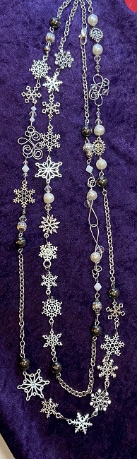Photo of our Shimmering Snowflurry necklace, doubled.